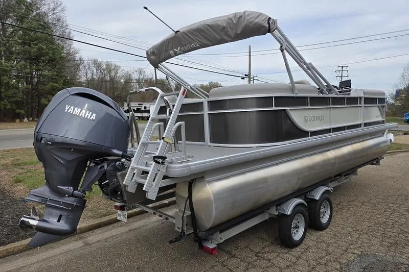Slide: The Image of 2025 Godfrey Xperience 2286 SBX pontoon boat with Yamaha motor on trailer. - 3