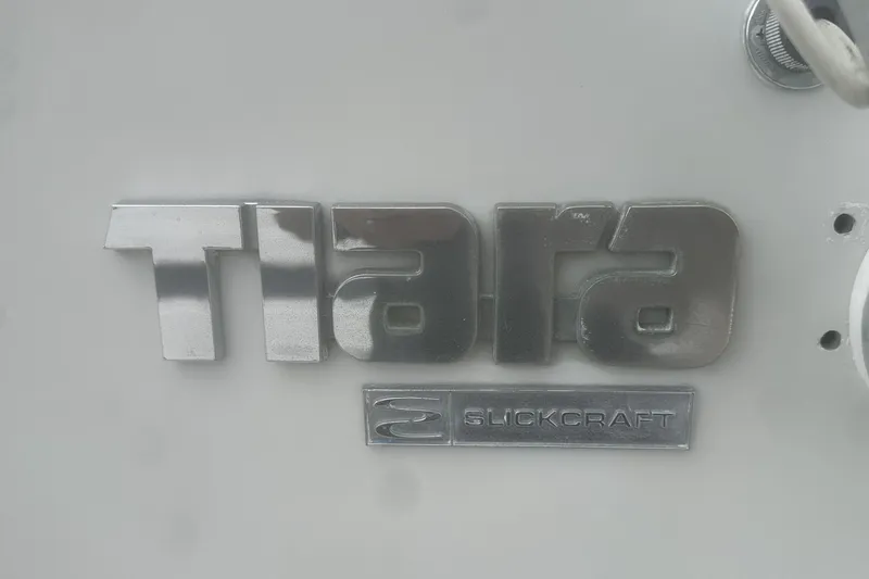 Slide: The Image of Tiara 25 Slickcraft logo on a 1985 model boat. - 21