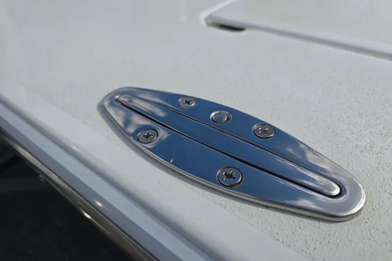 Slide: The Image of Close-up of a 1988 Lake & Bay Boca Grande 20 boat cleat on deck. - 15