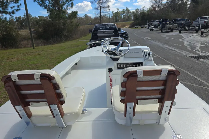 Slide: The Image of 1988 Lake & Bay Boca Grande 20 boat with dual seats and steering console. - 17