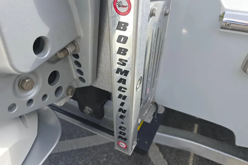 Slide: The Image of Close-up of a 1988 Lake & Bay Boca Grande 20 boat component with "bobsmachine.com" branding. - 21