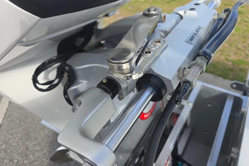 Slide: The Image of Close-up of 1988 Lake & Bay Boca Grande 20 boat engine components. - 23