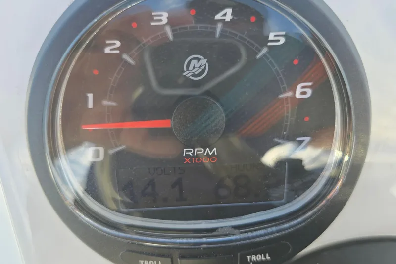 Slide: The Image of Tachometer of 1988 Lake & Bay Boca Grande 20 showing RPM and voltage. - 25