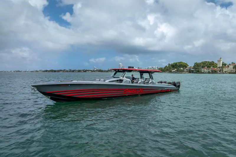 Slide: The Image of 2022 Nor-Tech 500 Sport Center Console boat on water, featuring sleek design and vibrant colors. - 16