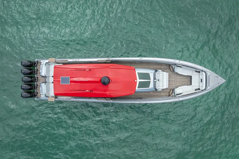 Slide: The Image of Aerial view of 2022 Nor-Tech 500 Sport Center Console boat on water. - 2