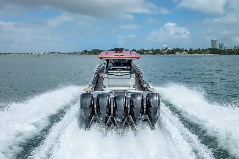Slide: The Image of 2022 Nor-Tech 500 Sport Center Console speeding on water, showcasing powerful engines. - 28