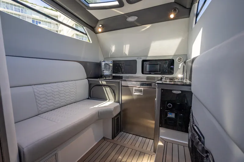 Slide: The Image of Luxurious interior of 2022 Nor-Tech 500 Sport Center Console with modern amenities. - 42