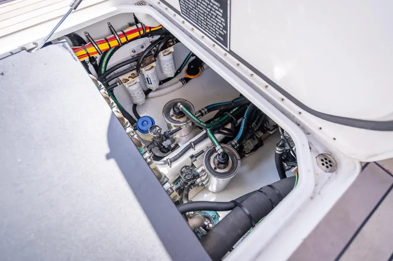 Slide: The Image of Engine compartment of 2022 Nor-Tech 500 Sport Center Console boat. - 65