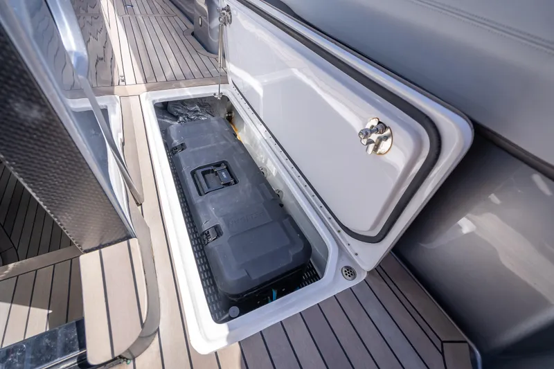 Slide: The Image of Storage compartment on 2022 Nor-Tech 500 Sport Center Console boat. - 69