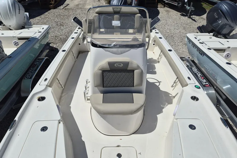 Slide: The Image of Interior of 2026 Key West 230 Bay Reef boat with seating and rod holders. - 11