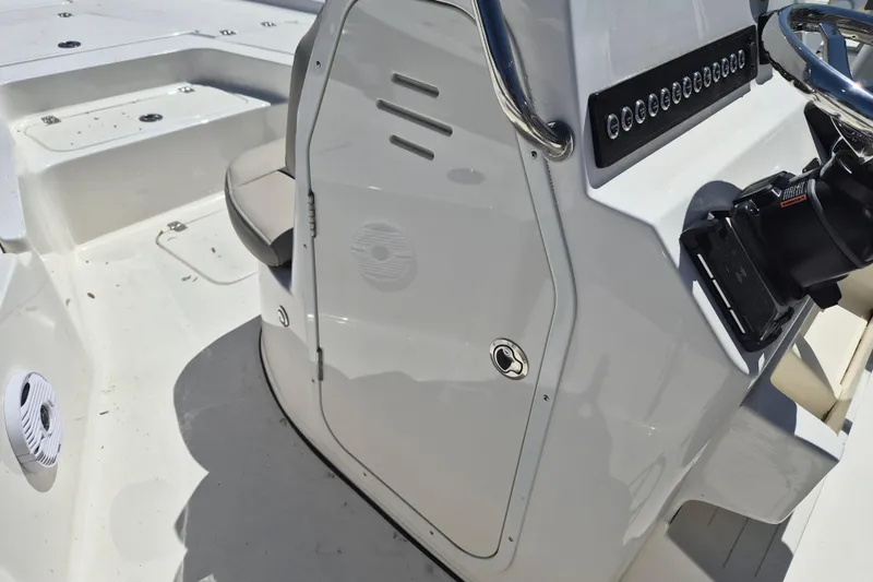 Slide: The Image of Open storage compartment on 2026 Key West 230 Bay Reef boat. - 13