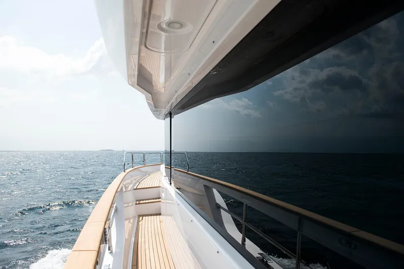 Slide: The Image of Luxurious Sirena 68 yacht cruising on open sea, 2026 model. - 18