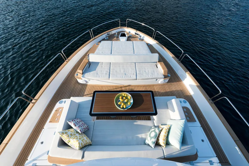 Slide: The Image of Luxurious Sirena 68 yacht deck with elegant seating and cushions, 2026 model. - 19