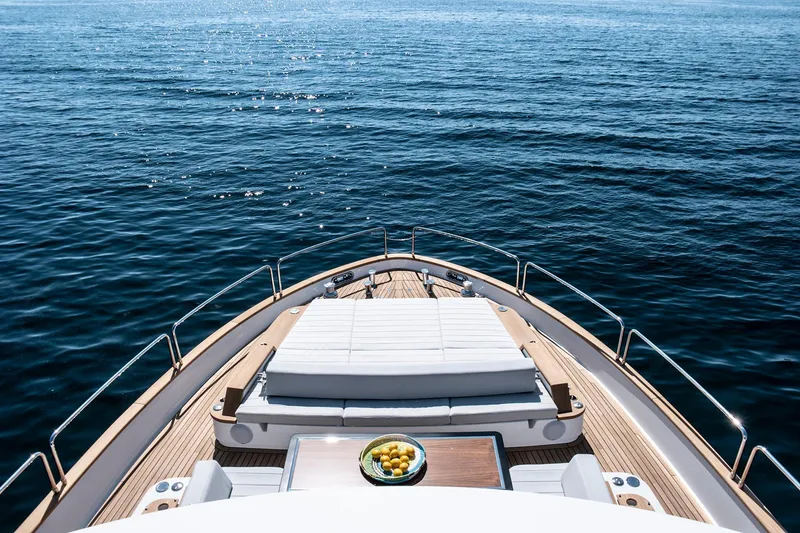 Slide: The Image of Luxurious Sirena 68 yacht deck with sun loungers and ocean view, 2026 model. - 21