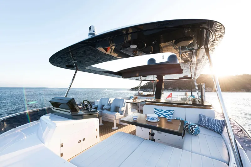 Slide: The Image of Luxurious 2026 Sirena 68 yacht deck with elegant seating and ocean view. - 34