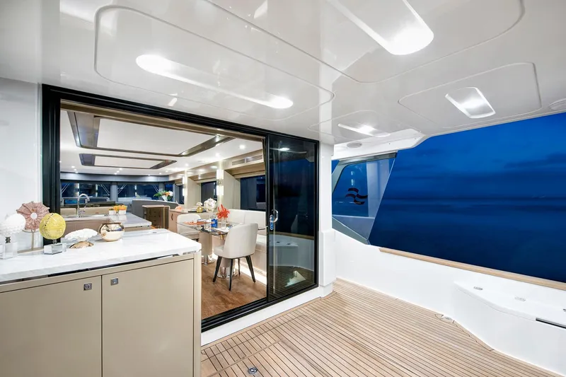 Slide: The Image of Luxurious interior of 2026 Sirena 68 yacht with elegant dining area and ocean view. - 43