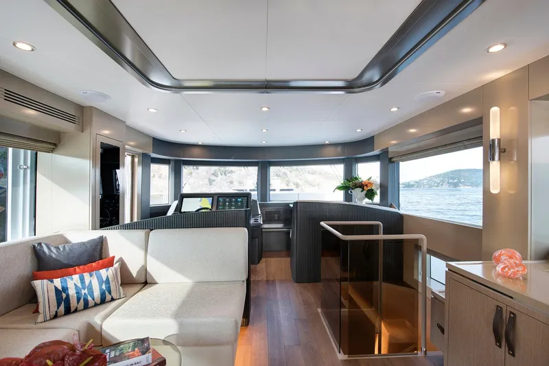 Slide: The Image of Luxurious interior of 2026 Sirena 68 yacht with modern furnishings and panoramic windows. - 46