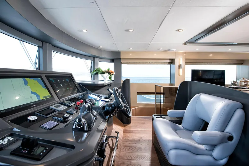 Slide: The Image of Luxurious interior of 2026 Sirena 68 yacht with modern helm and panoramic windows. - 47