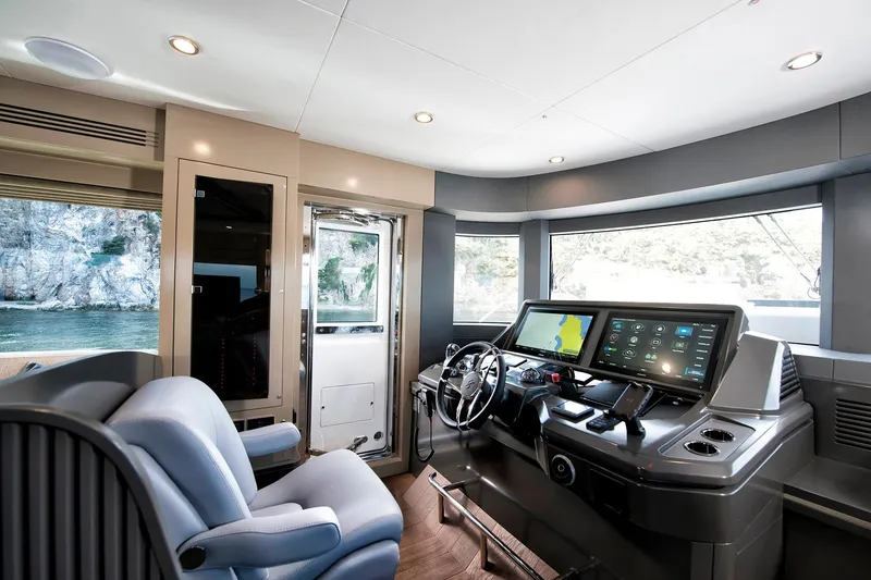 Slide: The Image of Luxurious interior of 2026 Sirena 68 yacht with modern helm and panoramic windows. - 48