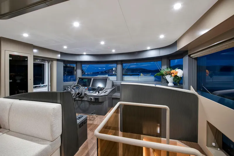 Slide: The Image of Luxurious interior of 2026 Sirena 68 yacht with modern helm and panoramic windows. - 49