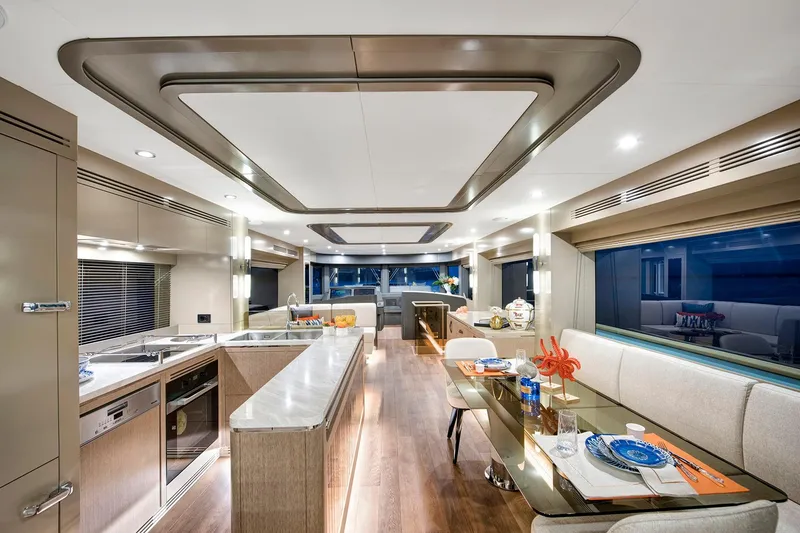Slide: The Image of Luxurious interior of 2026 Sirena 68 yacht with modern kitchen and dining area. - 50