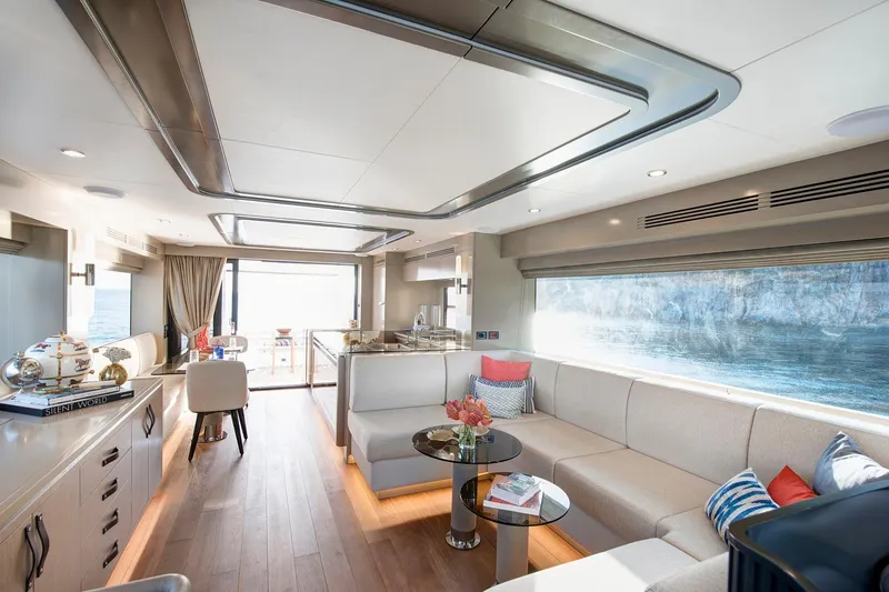 Slide: The Image of Luxurious interior of 2026 Sirena 68 yacht with modern furnishings and panoramic windows. - 55