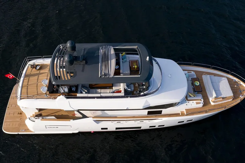 Slide: The Image of Aerial view of 2026 Sirena 68 yacht on open water. - 6