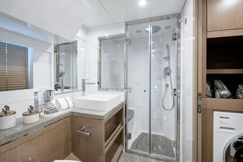 Slide: The Image of Luxurious bathroom in 2026 Sirena 68 yacht with modern shower and elegant fixtures. - 64