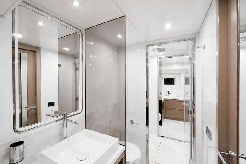 Slide: The Image of Modern bathroom interior on Sirena 68 yacht, 2026 model, featuring sleek fixtures and elegant design. - 66