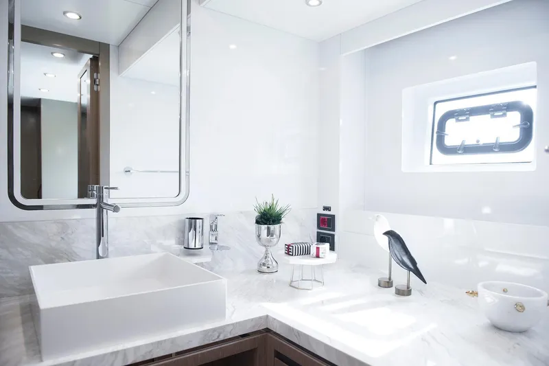 Slide: The Image of Luxurious bathroom interior on 2026 Sirena 68 yacht with modern fixtures and decor. - 69