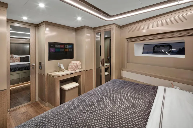 Slide: The Image of Luxurious interior of 2026 Sirena 68 yacht cabin with modern decor and amenities. - 70