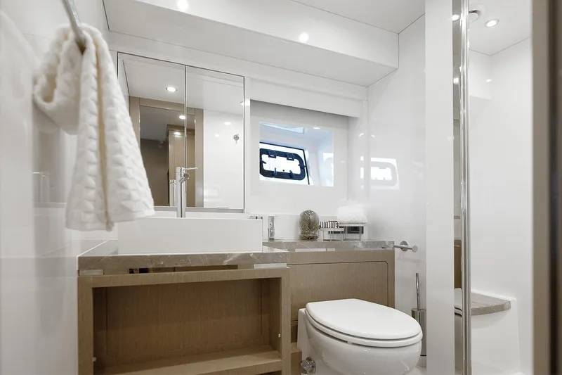 Slide: The Image of Modern bathroom interior on 2026 Sirena 68 yacht, featuring sleek design and elegant fixtures. - 73