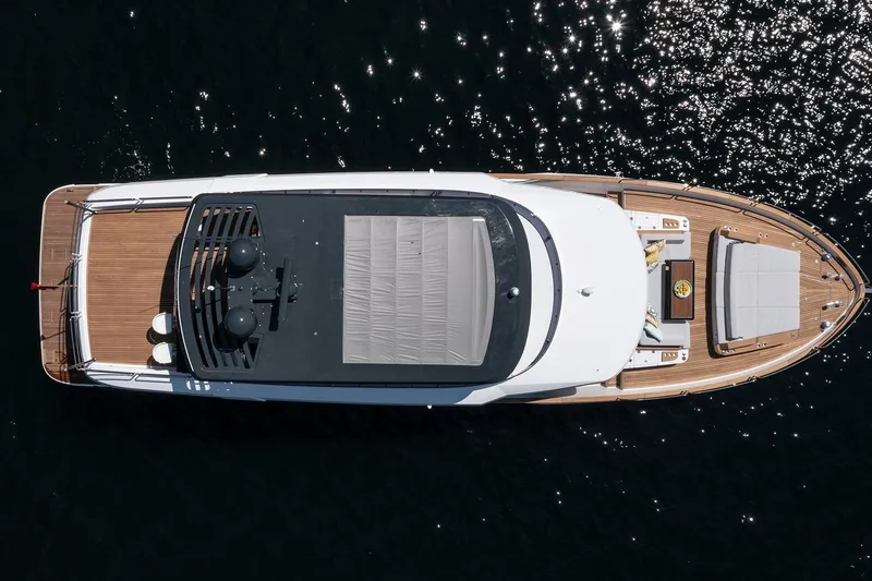 Slide: The Image of Top view of 2026 Sirena 68 yacht on sparkling water. - 8