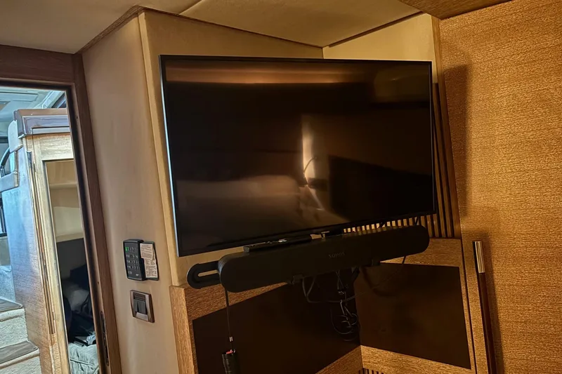 Slide: The Image of Flat-screen TV and soundbar in 2008 Azimut 47 yacht interior. - 14