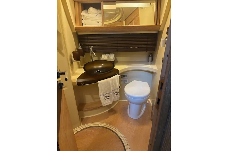 Slide: The Image of Luxurious bathroom in 2008 Azimut 47 yacht with modern fixtures and elegant design. - 17