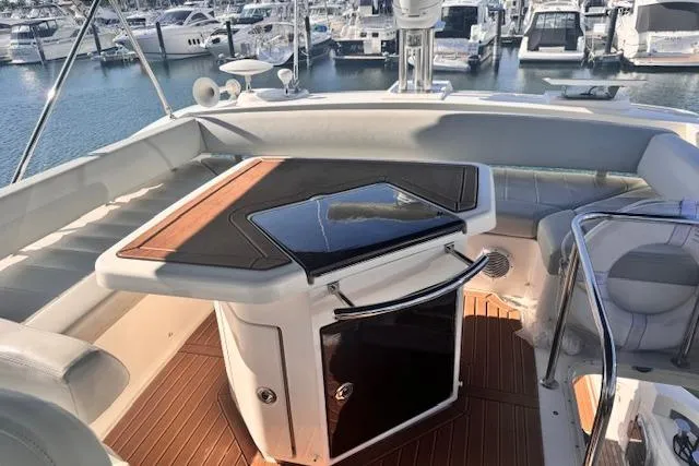 Slide: The Image of Luxurious 2008 Azimut 47 yacht deck with elegant seating and marina view. - 2