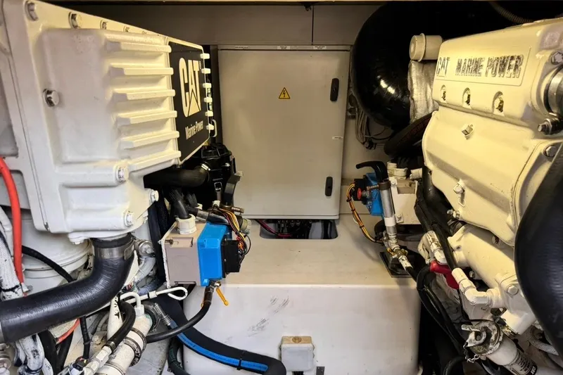 Slide: The Image of Engine room of a 2008 Azimut 47 yacht featuring CAT Marine Power engines. - 24