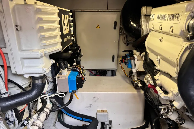 Slide: The Image of Engine room of a 2008 Azimut 47 yacht featuring CAT Marine Power components. - 29
