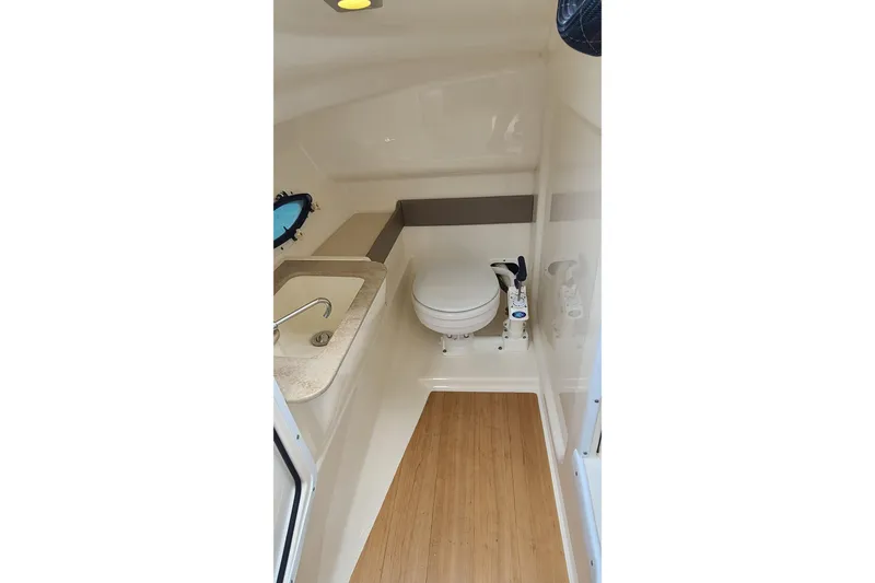 Slide: The Image of 2015 Formula 270 Bowrider boat interior with sink and toilet. - 12