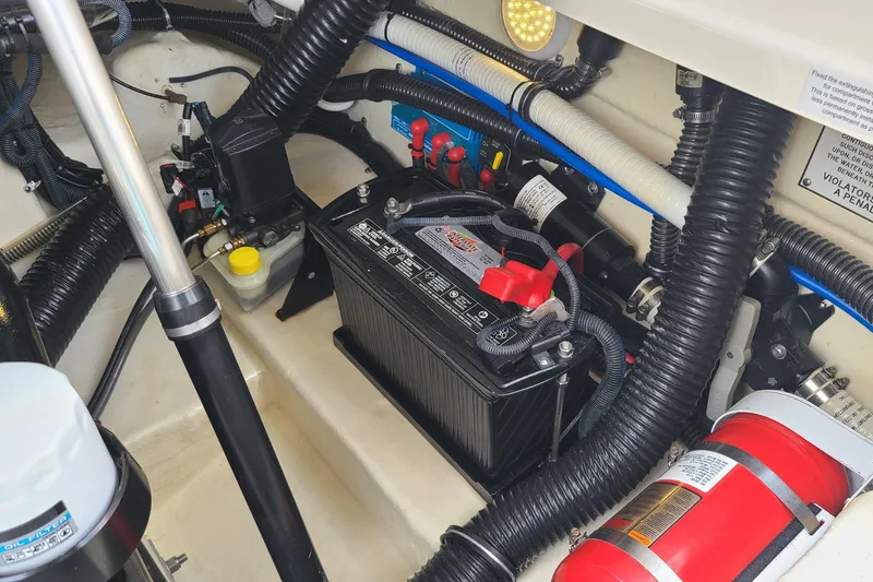 Slide: The Image of Engine compartment of a 2015 Formula 270 Bowrider with battery and wiring. - 17