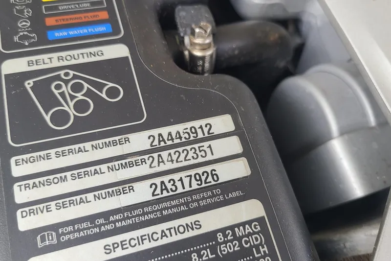 Slide: The Image of Engine compartment of a 2015 Formula 270 Bowrider showing serial numbers and belt routing diagram. - 21