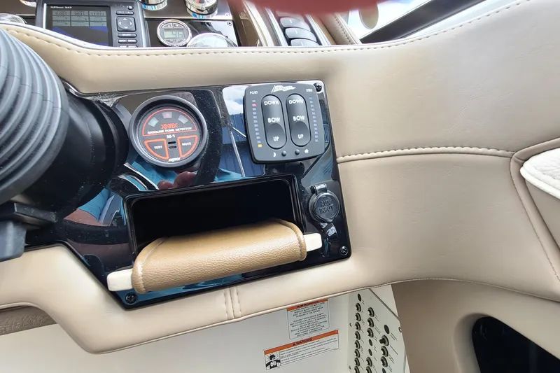 Slide: The Image of Dashboard of a 2015 Formula 270 Bowrider boat with controls and gauges. - 7