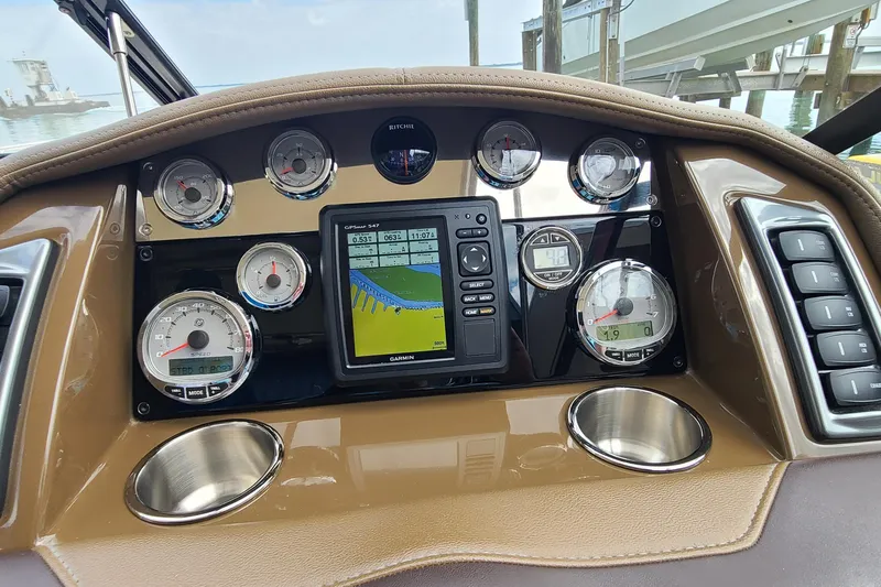 Slide: The Image of Dashboard of a 2015 Formula 270 Bowrider with navigation system and gauges. - 9