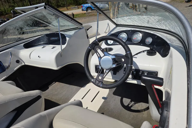 Slide: The Image of 2020 Starcraft Limited Runabout 172 OB Sport boat interior with steering wheel and dashboard. - 13