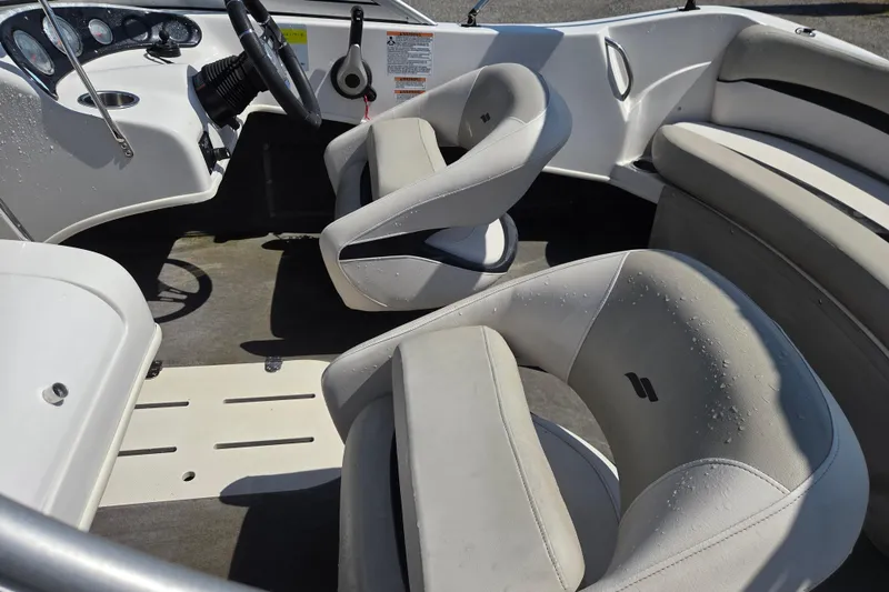 Slide: The Image of Interior of 2020 Starcraft Limited Runabout 172 OB Sport boat with seating and controls. - 15