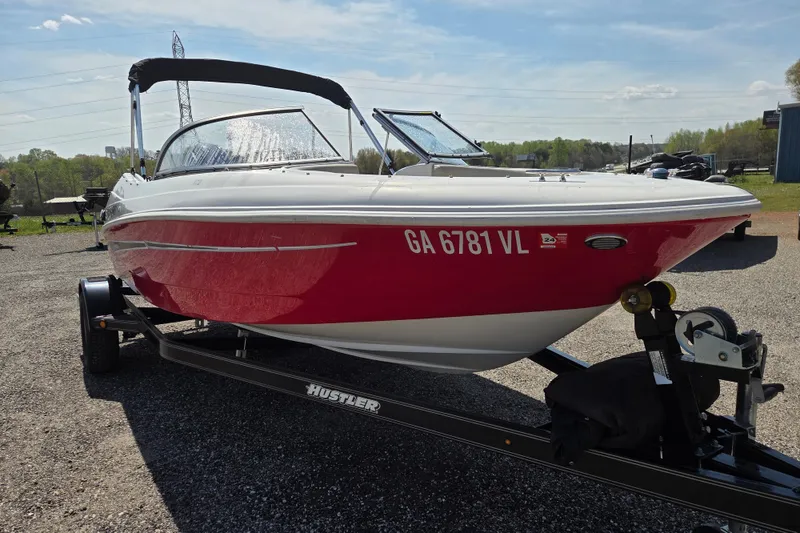 Slide: The Image of 2020 Starcraft Limited Runabout 172 OB Sport boat on trailer, red and white exterior. - 3