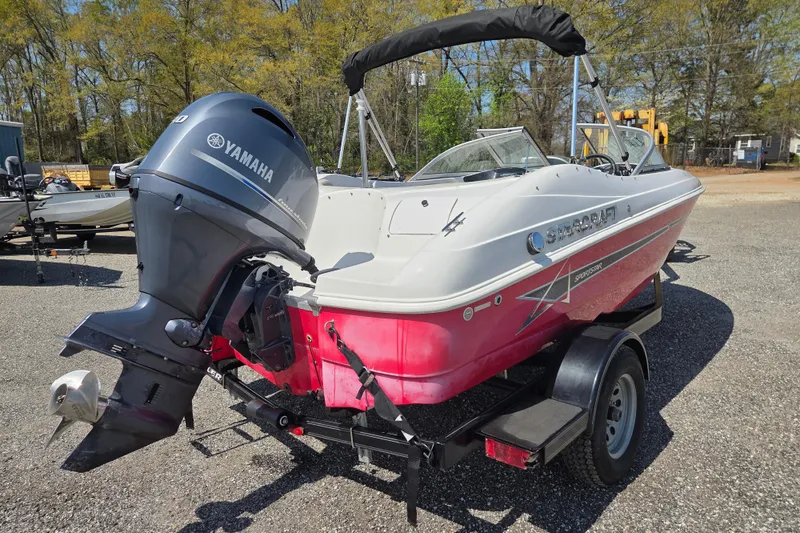 Slide: The Image of 2020 Starcraft Limited Runabout 172 OB Sport boat with Yamaha outboard motor on trailer. - 5