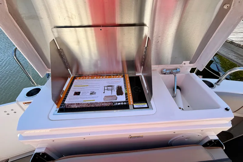 Slide: The Image of Boat galley with stove and sink on 2022 Cutwater C-32 CB. - 20