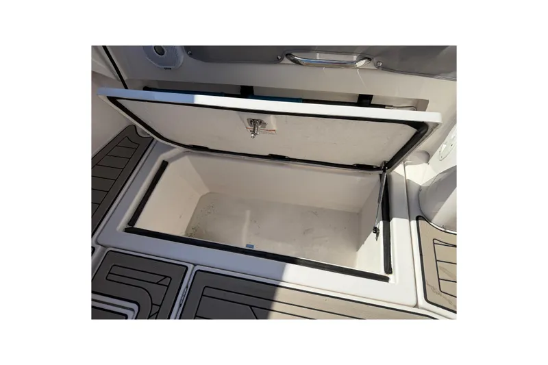 Slide: The Image of Open storage compartment on 2022 Cutwater C-32 CB boat deck. - 25