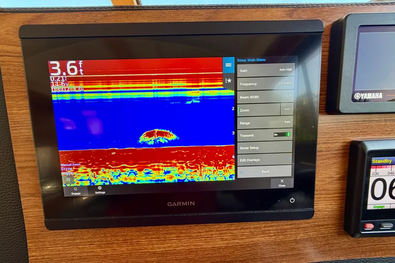 Slide: The Image of Garmin sonar display on 2022 Cutwater C-32 CB boat, showing depth and settings. - 40